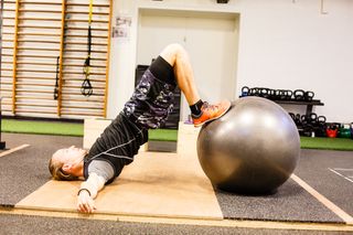 Swiss ball hamstring curl